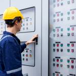 electrical-engineer-working-in-control-room-2023-11-27-05-05-19-utc