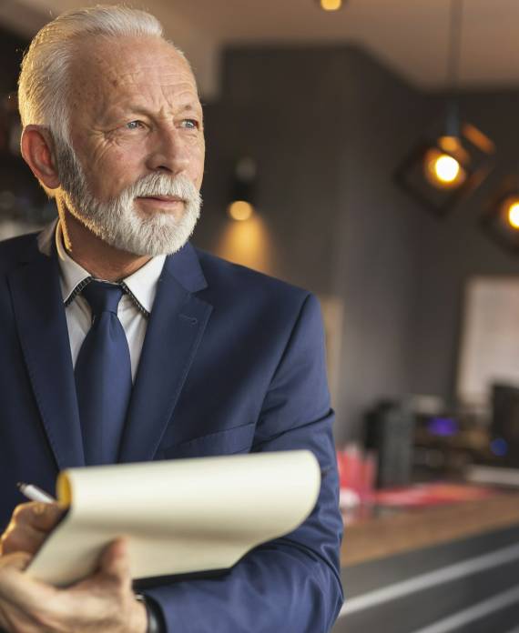 Restaurant manager signing contracts