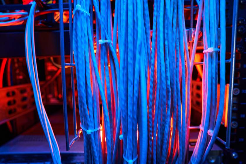 Bunch of twisted pair cables in server cabinet